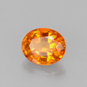 Clinohumita laranja natural 1,17ct, corte oval, VS-SI