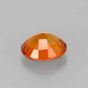 Clinohumita laranja natural 1,17ct, corte oval, VS-SI