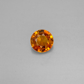 Clinohumita Amarelo alaranjado Natural 0.63ct, Corte Redondo, VS-SI