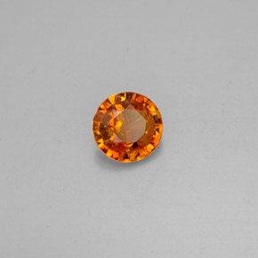 Clinohumita Amarelo alaranjado Natural 0.63ct, Corte Redondo, VS-SI