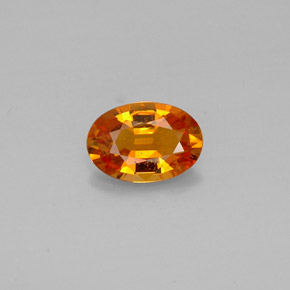Clinohumita laranja natural 0,93ct, corte oval, VS-SI