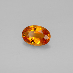 Clinohumita laranja natural 0,93ct, corte oval, VS-SI