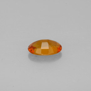 Clinohumita laranja natural 0,93ct, corte oval, VS-SI