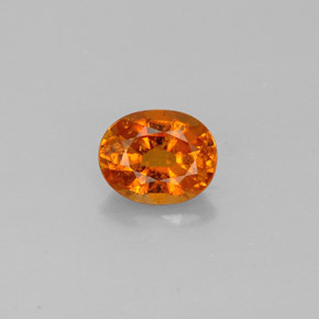 Clinohumita laranja natural 0,92ct, corte oval, SI