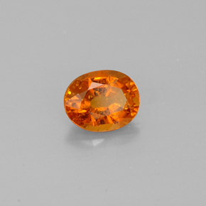 Clinohumita laranja natural 0,92ct, corte oval, SI