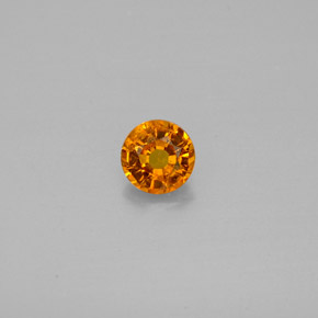 Clinohumita laranja natural 0,48ct, corte redondo, SI