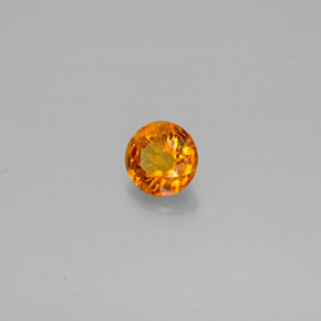 Clinohumita laranja natural 0,48ct, corte redondo, SI