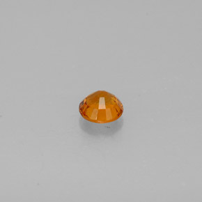 Clinohumita laranja natural 0,48ct, corte redondo, SI