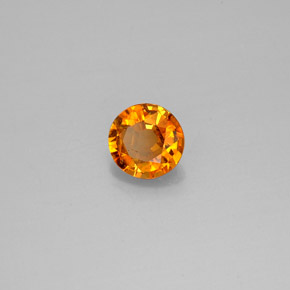 Clinohumita laranja natural 0,57ct, corte redondo, SI