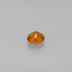 Clinohumita Amarelo alaranjado Natural 0.64ct, Corte Redondo, SI