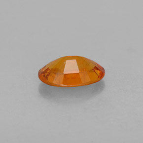 Clinohumita laranja natural 1,42ct, corte oval, SI