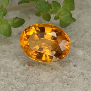 Clinohumita laranja natural 0,84ct, corte oval, VS-SI
