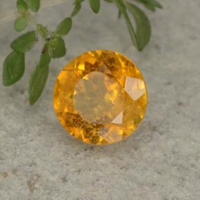 Clinohumita Amarelo dourado Natural 1.35ct, Corte Redondo, VS-SI