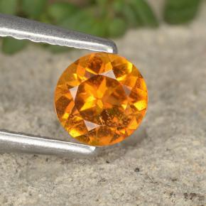 Clinohumita laranja natural 0,38ct, corte redondo, VS-SI
