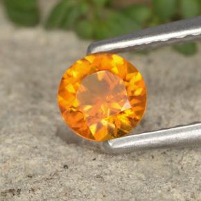 Clinohumita laranja natural 0,38ct, corte redondo, VS-SI