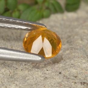 Clinohumita laranja natural 0,38ct, corte redondo, VS-SI