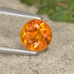 Clinohumita laranja natural 0,49ct, corte redondo, VS-SI
