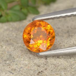 Clinohumita laranja natural 0,49ct, corte redondo, VS-SI