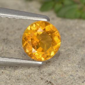 Clinohumita amarelo natural 0,42ct, corte redondo, VS-SI