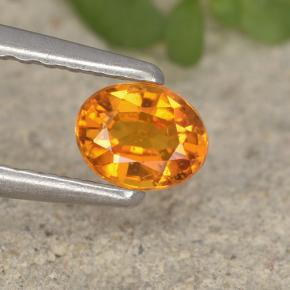 Clinohumita laranja natural 0,33ct, corte oval, VS-SI