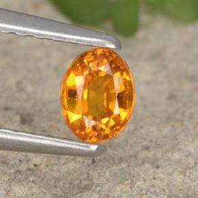 Clinohumita laranja natural 0,33ct, corte oval, VS-SI