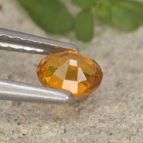 Clinohumita laranja natural 0,33ct, corte oval, VS-SI
