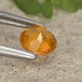 Clinohumita laranja natural 0,34ct, corte redondo, VS-SI
