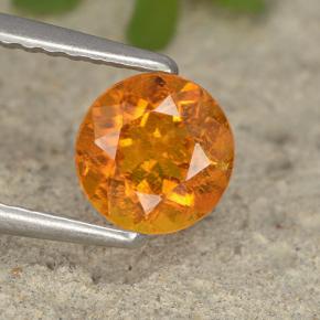 Clinohumita laranja natural 0,86ct, corte redondo, VS-SI