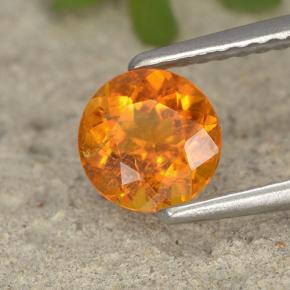 Clinohumita laranja natural 0,86ct, corte redondo, VS-SI