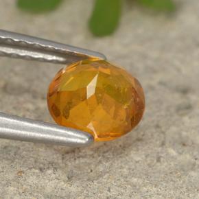 Clinohumita laranja natural 0,86ct, corte redondo, VS-SI