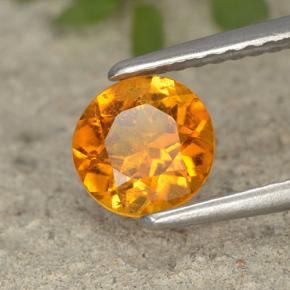 Clinohumita Amarelo alaranjado Natural 0.87ct, Corte Redondo, VS-SI