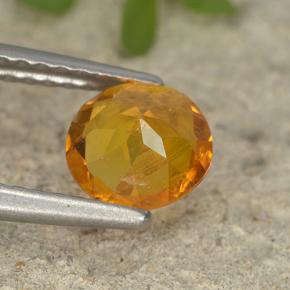 Clinohumita Amarelo alaranjado Natural 0.87ct, Corte Redondo, VS-SI