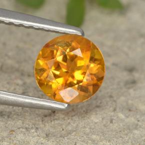Clinohumita laranja natural 0,75ct, corte redondo, VS-SI