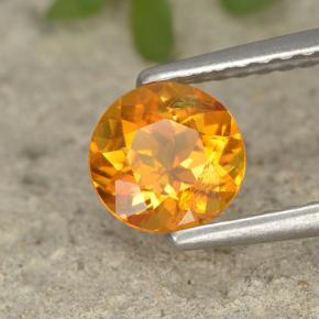 Clinohumita laranja natural 0,75ct, corte redondo, VS-SI