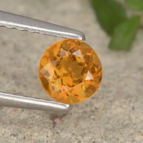 Clinohumita laranja natural 0,46ct, corte redondo, VS-SI