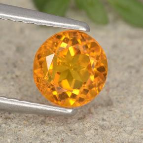 Clinohumita laranja natural 0,94ct, corte redondo, VS-SI