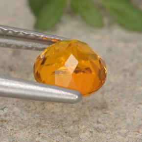 Clinohumita laranja natural 0,94ct, corte redondo, VS-SI