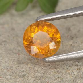 Clinohumita laranja natural 0,46ct, corte redondo, VS-SI