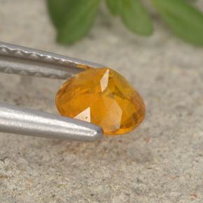 Clinohumita laranja natural 0,46ct, corte redondo, VS-SI