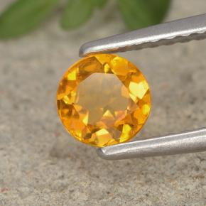 Clinohumita Amarelo alaranjado Natural 0.41ct, Corte Redondo, VS-SI