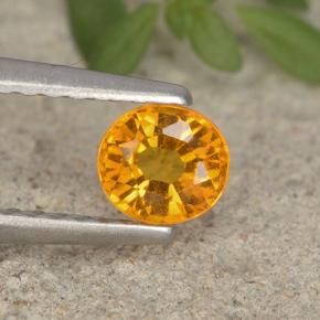 Clinohumita laranja natural 0,41ct, corte oval, VS-SI