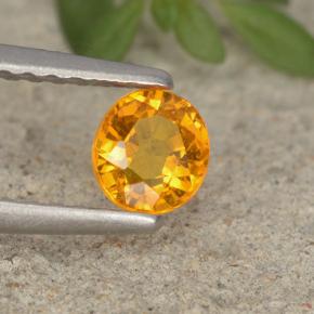 Clinohumita laranja natural 0,41ct, corte oval, VS-SI