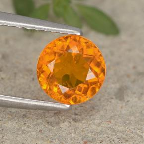 Clinohumita laranja natural 0,95ct, corte redondo, VS-SI
