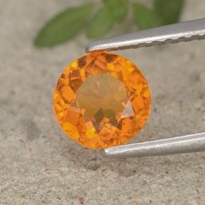 Clinohumita laranja natural 0,95ct, corte redondo, VS-SI