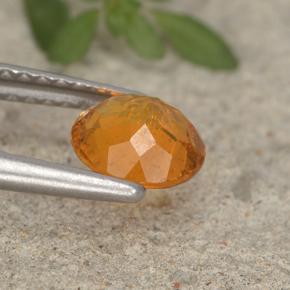 Clinohumita laranja natural 0,95ct, corte redondo, VS-SI