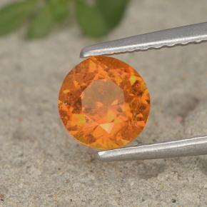 Clinohumita laranja natural 0,93ct, corte redondo, VS-SI