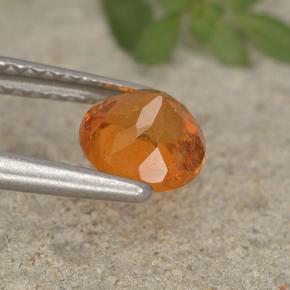 Clinohumita laranja natural 0,93ct, corte redondo, VS-SI