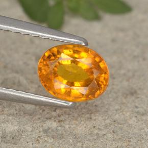 Clinohumita laranja natural 0,91ct, corte oval, VS-SI