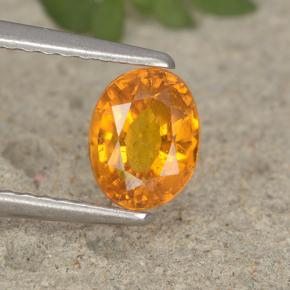 Clinohumita laranja natural 0,91ct, corte oval, VS-SI