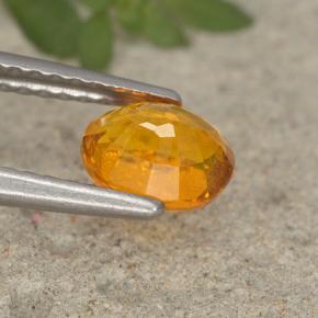 Clinohumita laranja natural 0,91ct, corte oval, VS-SI